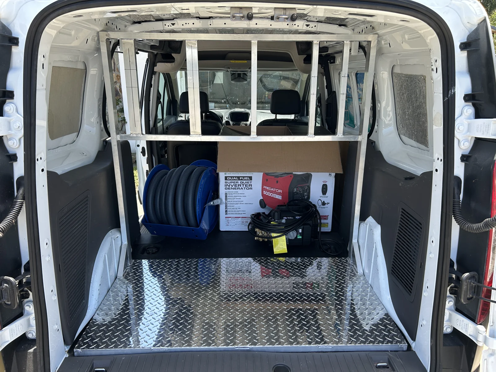 Custom aluminum platform and frame in a work van