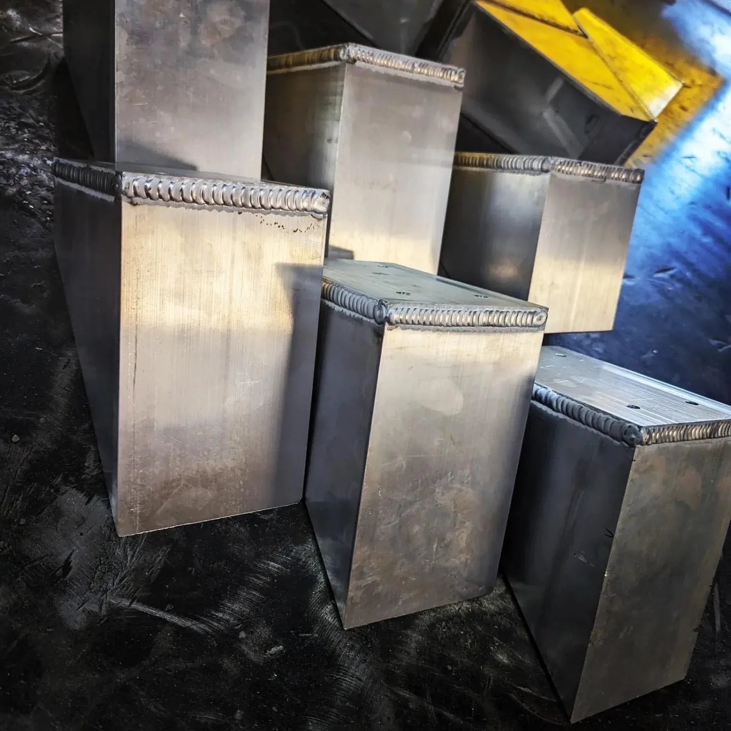 Custom fabricated metal components with welded caps