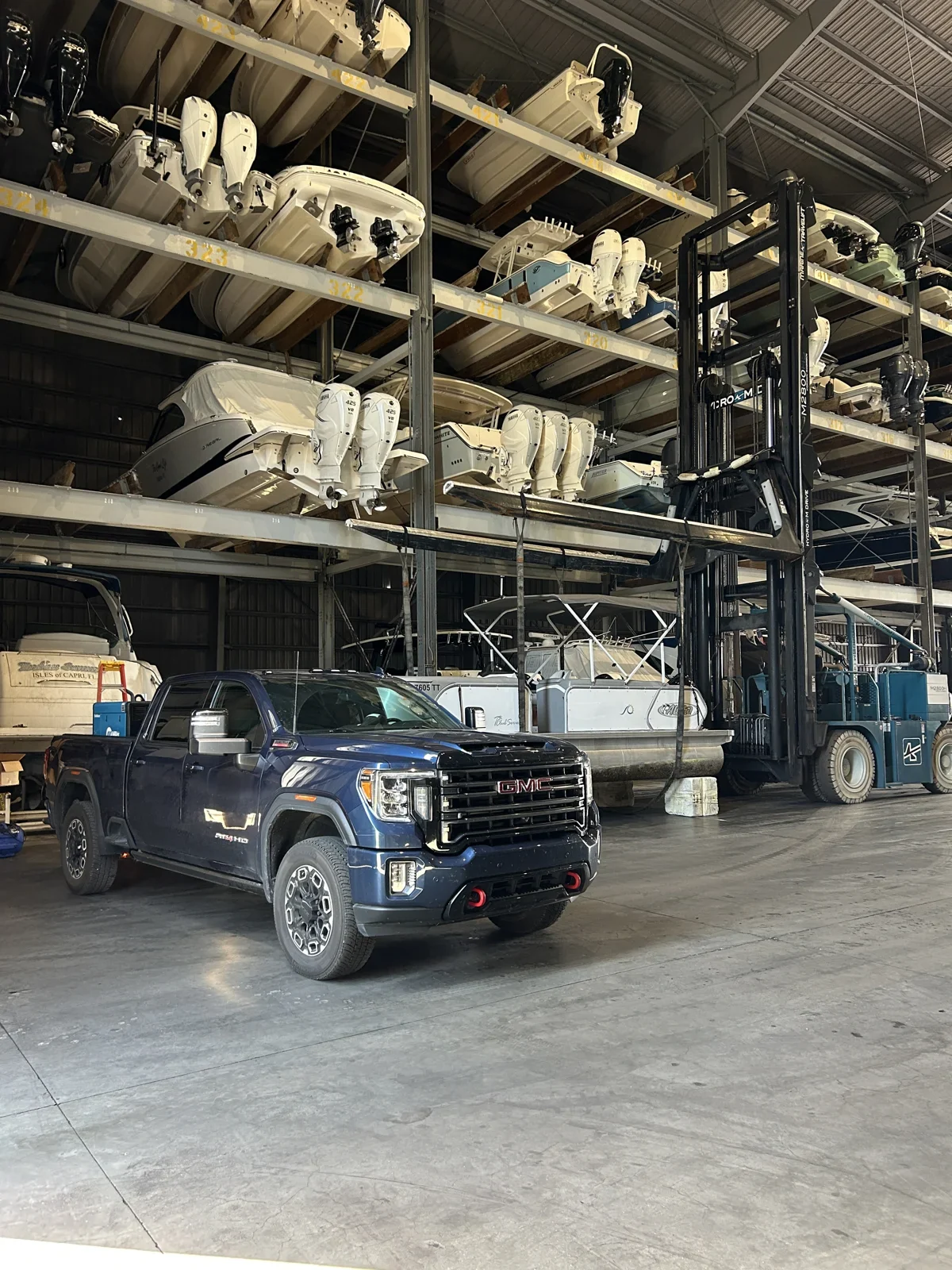On Time Welding mobile service truck inside a marina dry storage building